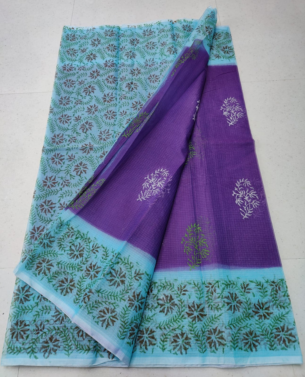 Exquisite Purple Colored Green Leafy KotaDoria Dye Block Printed Cotton Saree With Running Blouse