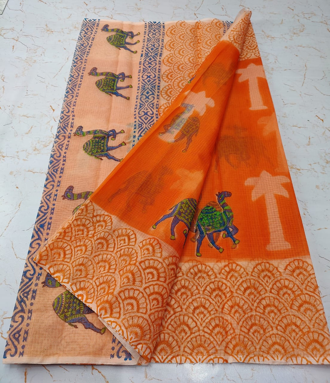 Exquisite Peach and Orange Colored KotaDoria Dye Camel Block Printed Cotton Saree With Running Blouse